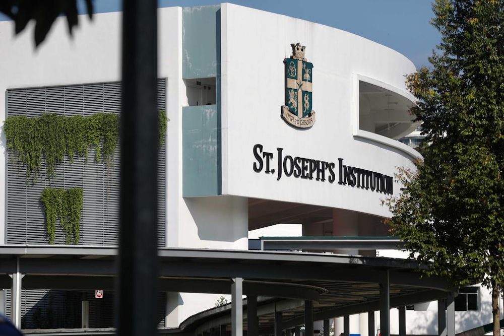 Singapore student taken to hospital after falling from ...