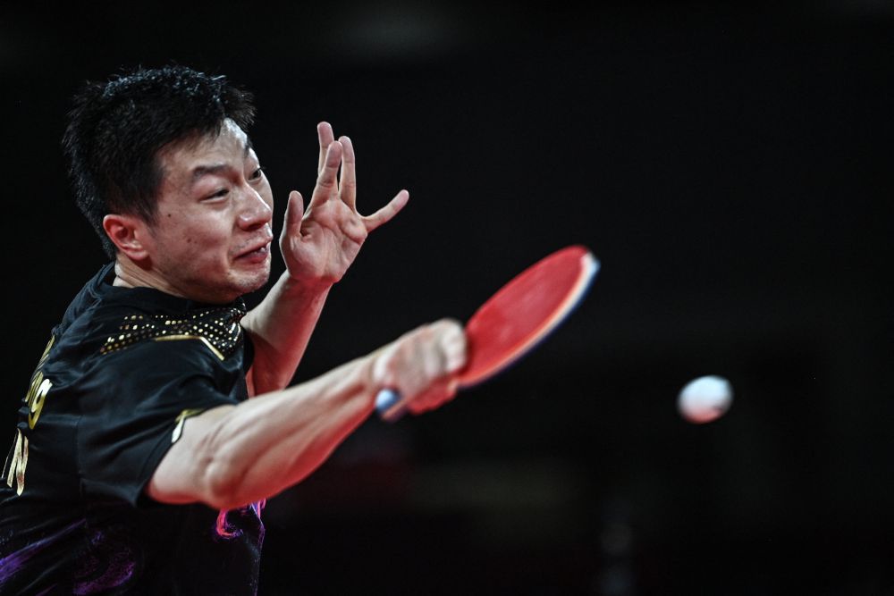 China's Ma beats compatriot to retain Olympic table tennis ...
