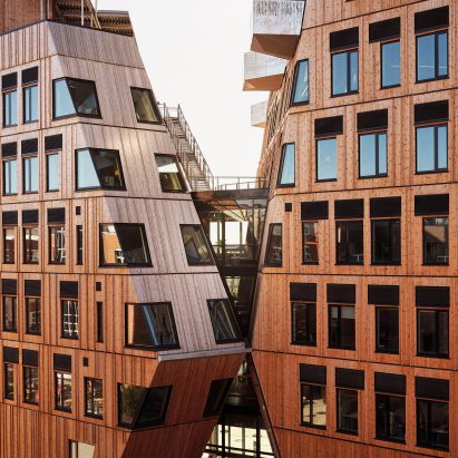 Image showcasing Snøhetta unveils angled office and apartment high-rises in Oslo