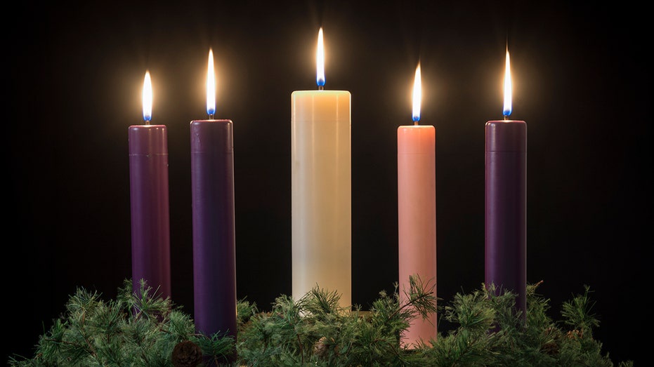 What is an Advent wreath and what do its candles mean during this holy