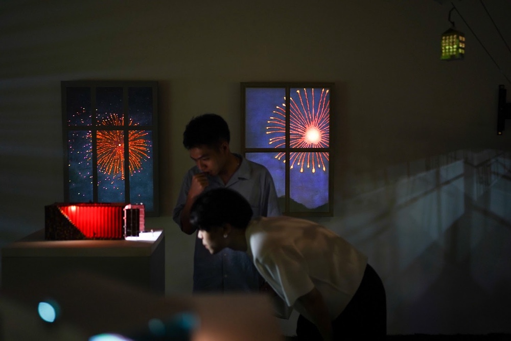 Visitors exploring and immersing themselves in The Infinite-land interactive art installations
