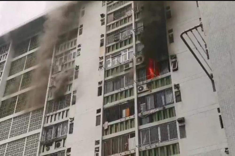 Man dies after fall from building during ‘suspicious’ blaze in Hong Kong