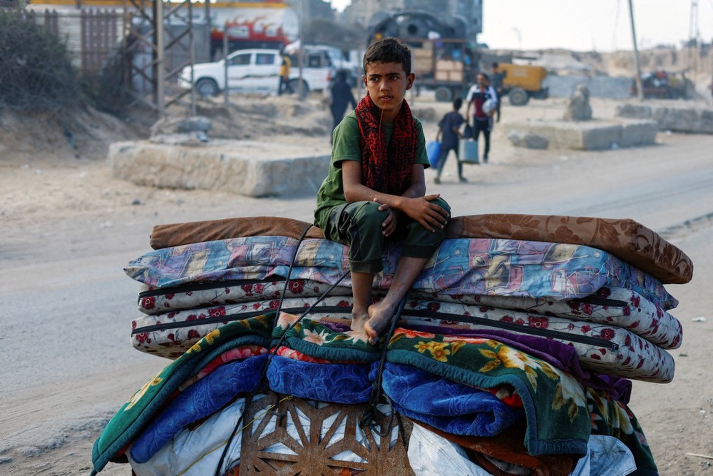 Israel opens new route out of Gaza City, as death toll passes 65,000