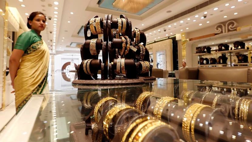 Gold takes a breather after safe-haven demand fuels record run