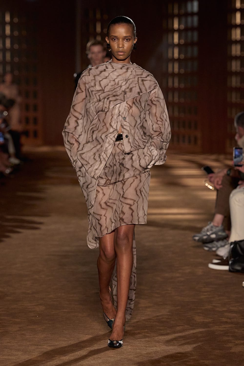 Image from: Haute Intellectualism: See The Best Looks From Milan Fashion Week’s Spring/Summer 2027 Runways