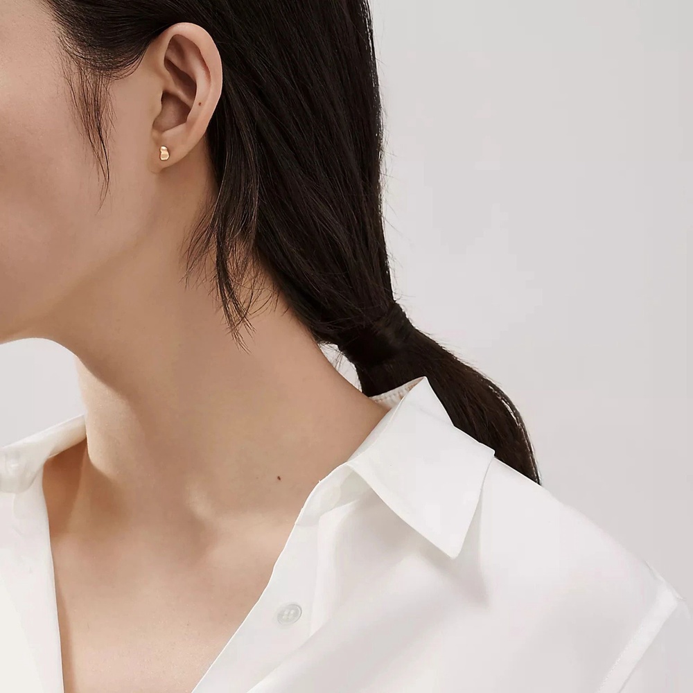 Image from: Teeny Tiny Earrings Are Having a Very Big Moment, As Seen on Jennie, Lisa, Momo, and More