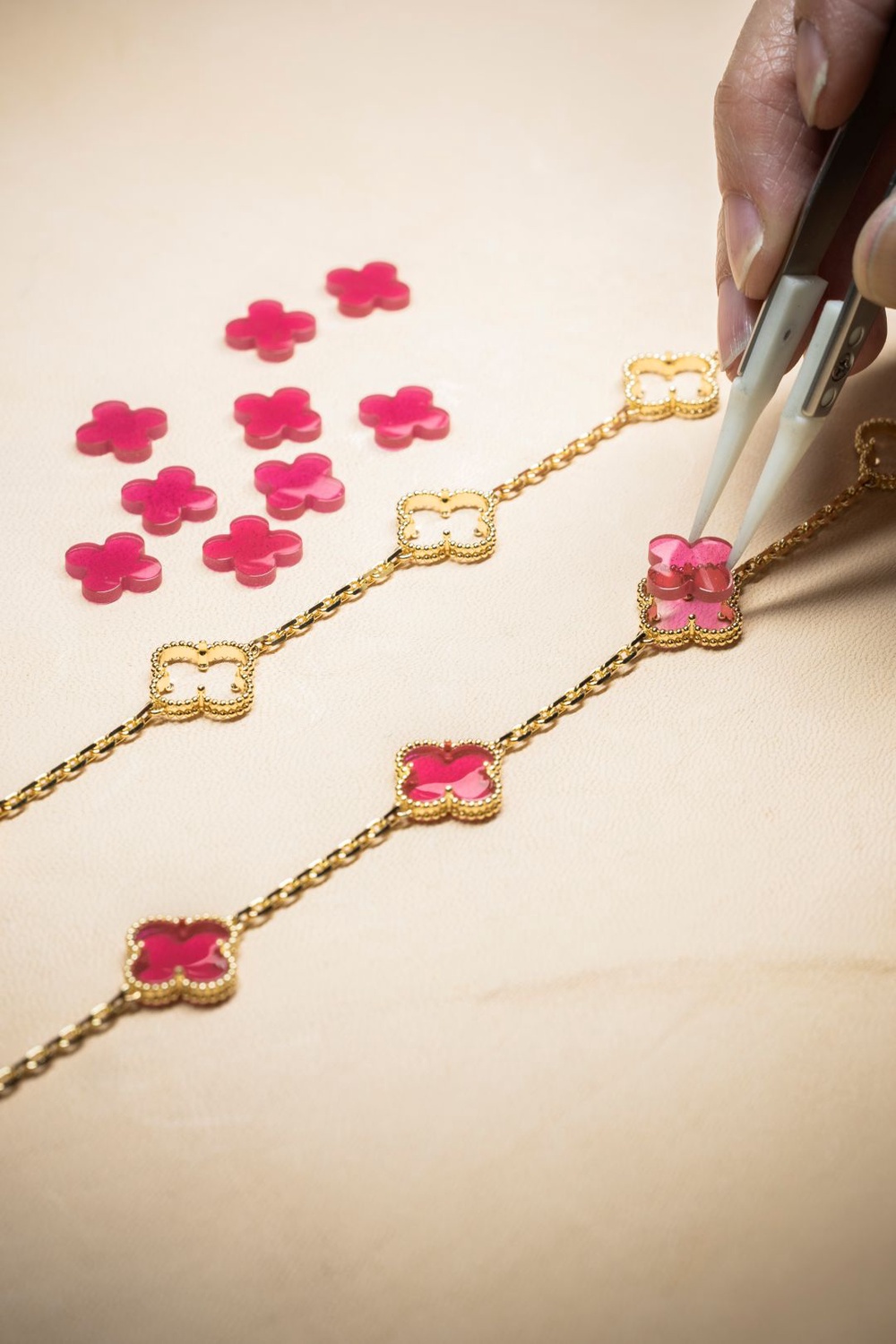 Image from: The Van Cleef & Arpels Alhambra Gets a Surprising New Material and Colour: Pink Enamel