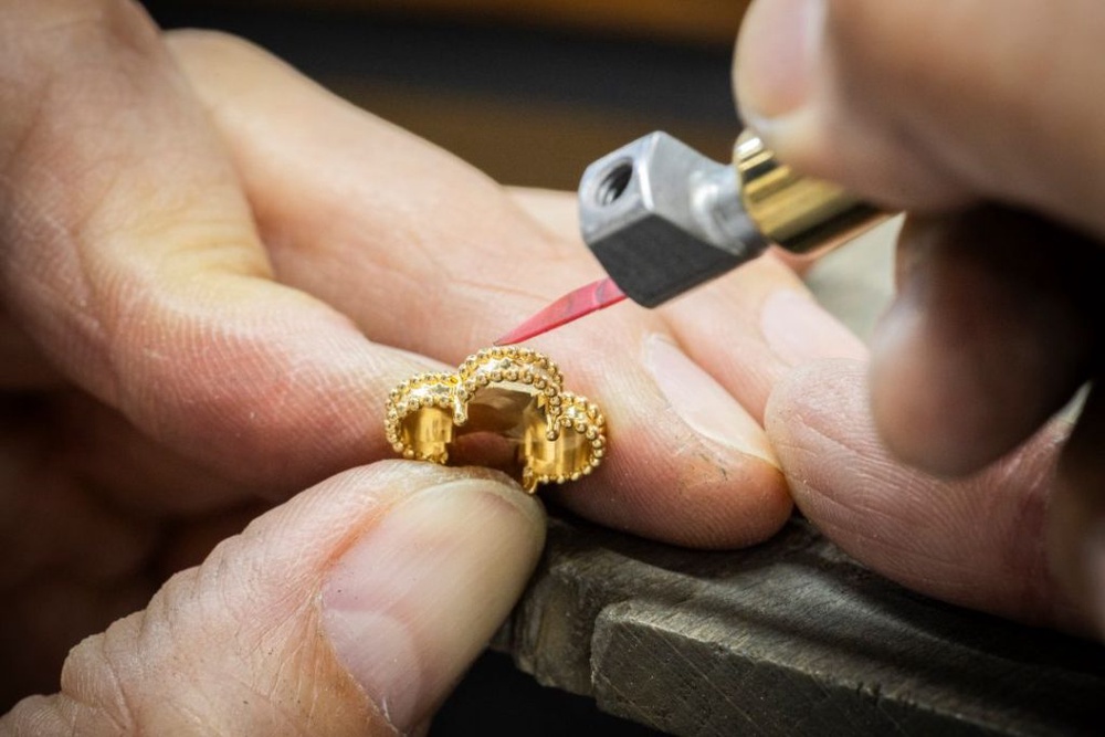 Image from: The Van Cleef & Arpels Alhambra Gets a Surprising New Material and Colour: Pink Enamel