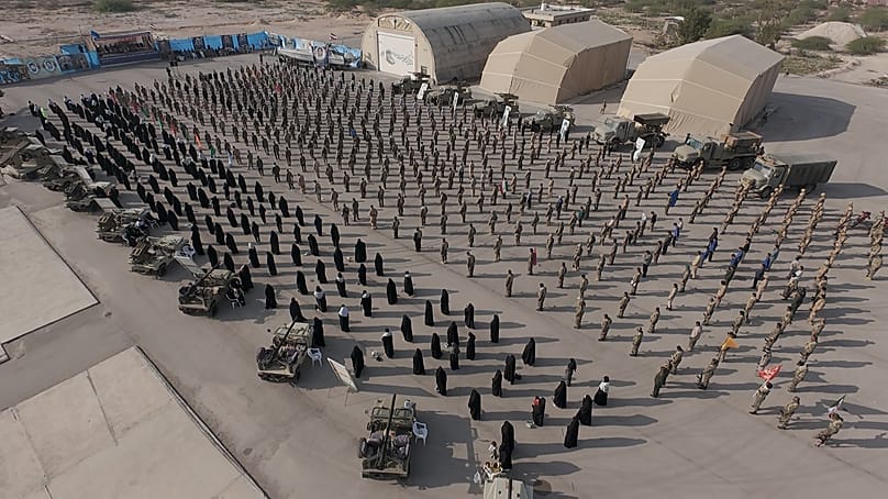 FILE: IRGC troops standing at attention during the guard's drill in the Persian Gulf, 16 February 2026