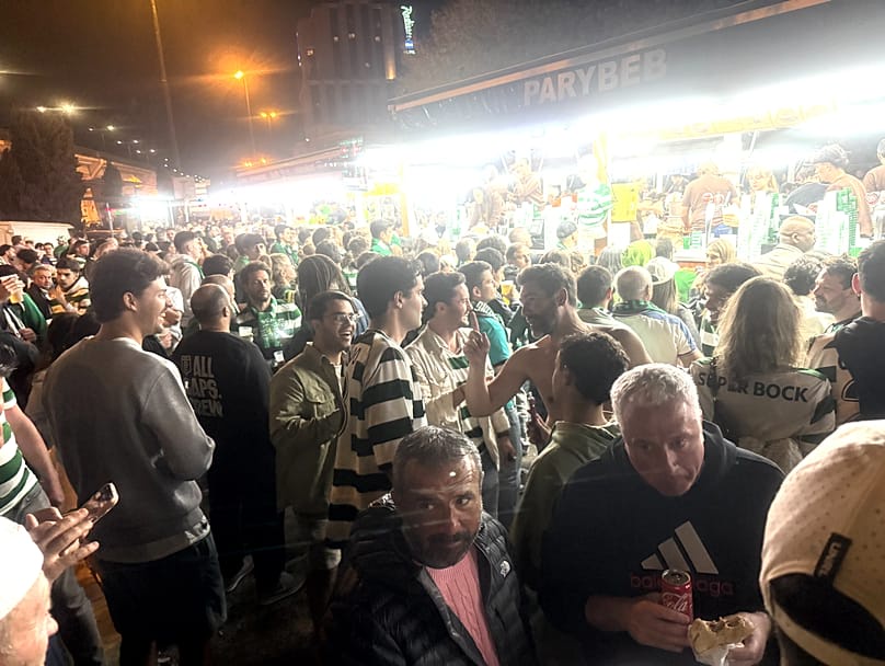 Fans by the food trucks on a match day at Alvalade