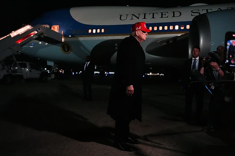 US President Donald Trump speaks with reporters after disembarking Air Force One at Joint Base Andrews, MD, 12 April 2026
