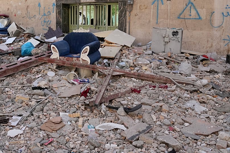 Debris of a residential building scattered in southeastern Tehran, 14 April, 2026