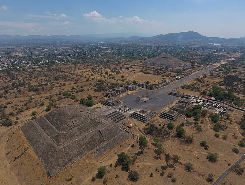 FILE - The Pyramid of the Moon and the Pyramid of the Sun are seen along with smaller structures lining the Avenue of the Dead, in Teotihuacan, Mexico, March 19, 2020