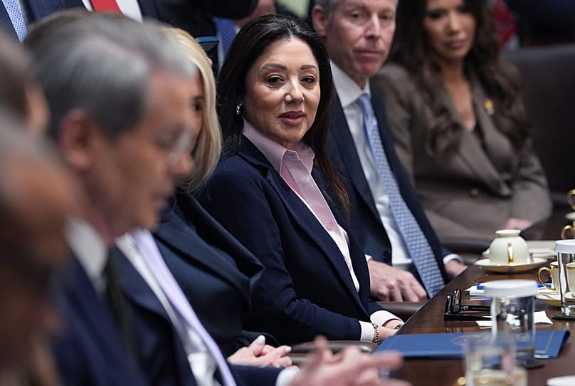 Labor Secretary Lori Chavez-DeRemer listens while Treasury Secretary Scott Bessent speaks during a cabinet meeting at the White House, Thursday, Jan. 29, 2026, in Washington