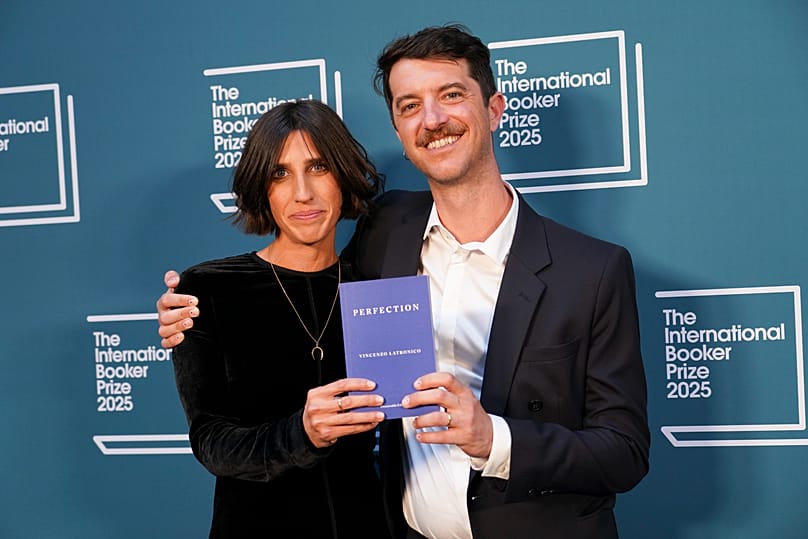 FILE -Translator Sophie Hughes (left) and author of 'Perfection' Vincenzo Latronico (right) arrive for the International Booker Prize, in London, United Kingdom, May 20, 2025.