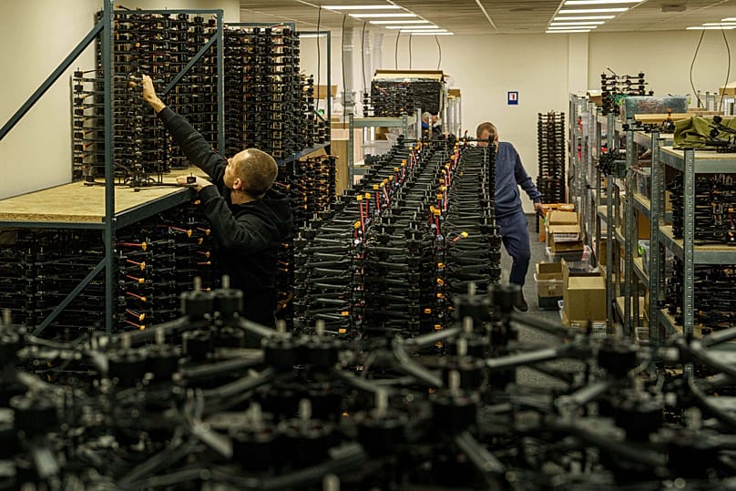 An engineer collects FPV drones of 