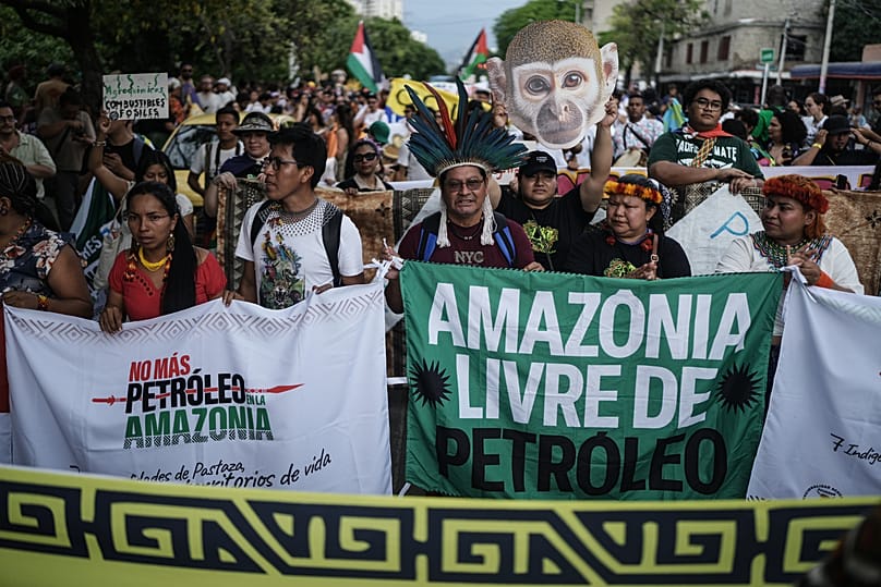 Activists participate in a demonstration during a conference aimed at transitioning away from fossil fuels Monday, April 27, 2026, in Santa Marta, Colombia.