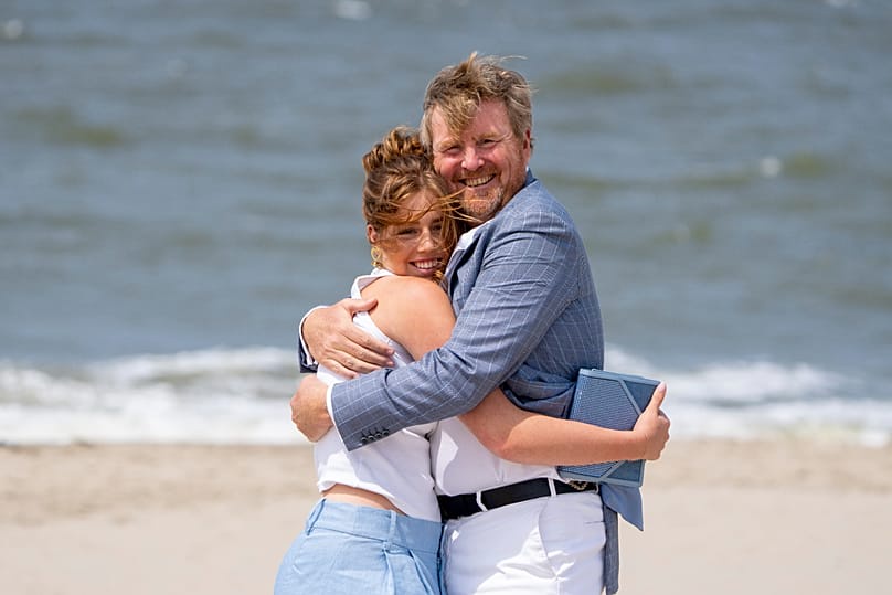 Dutch King Willem-Alexander hugs his daughter Princess Alexia as they pose for the media in The Hague, 30 June, 2023