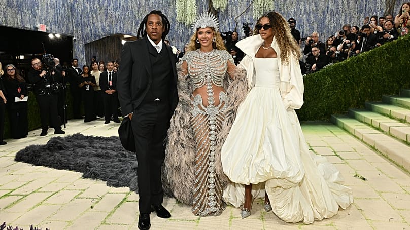 From left, Jay-Z, Beyoncé and Blue Ivy Carter arrive at the Met Gala in New York, 4 May 2026