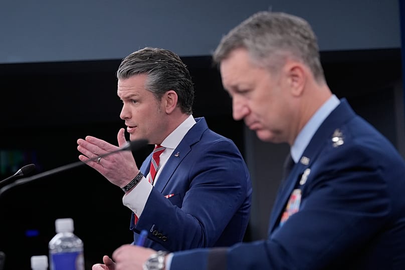 Defence Secretary Pete Hegseth and Chairman of the Joint Chiefs of Staff General Dan Caine speak at a press briefing at the Pentagon in Washington, 5 May, 2026