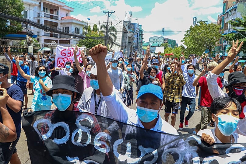Anti-coup protesters stage a rally in Yangon, 12 May, 2021 