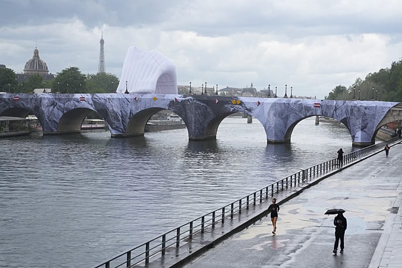 The scene along the Seine this week as installation work began on the 'Caverne du Pont Neuf' in Paris, 18 May 2026