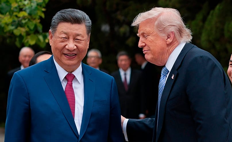 US President Donald Trump, right, speaks with Chinese President Xi Jinping while leaving after a visit to the Zhongnanhai Garden in Beijing, Friday, May 15, 2026