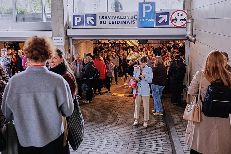 People take shelter in an underground car park during an air raid alert in Vilnius, 20 May, 2026