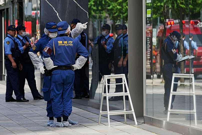 Tokyo police examine the scene after a person allegedly sprayed a substance that caused an odour in Tokyo, 25 May, 2026