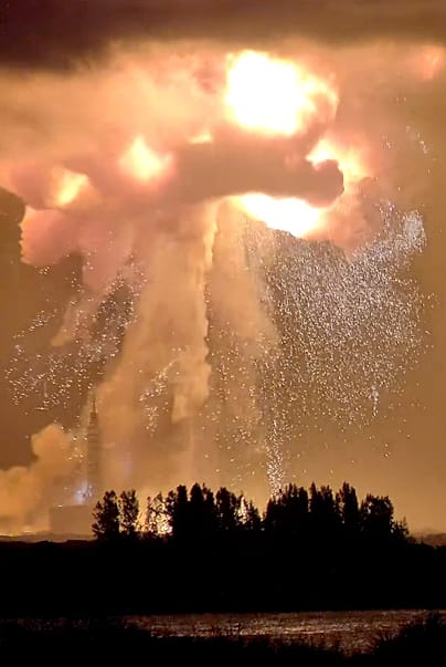 A Blue Origin New Glenn rocket explodes during an engine-firing test on Thursday, May 28, 2026, in Cape Canaveral, Florida.