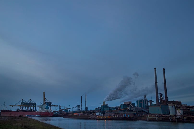 The Tata Steel factory is seen at dusk in IJmuiden, 4 December, 2018