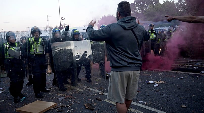 Police and protestors clash during a protest following the death of Henry Nowak  in Southampton, England, Tuesday 2 June 2026