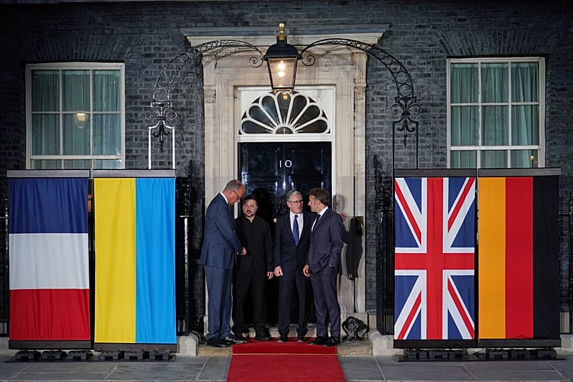 Friedrich Merz, Volodymyr Zelenskyy, Keir Starmer and Emmanuel Macron on the doorstep of 10 Downing Street in London, 7 June, 2026