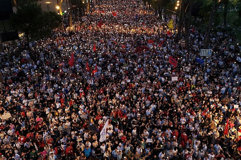 Protesters take part in a rally in Tirana, 9 June, 2026