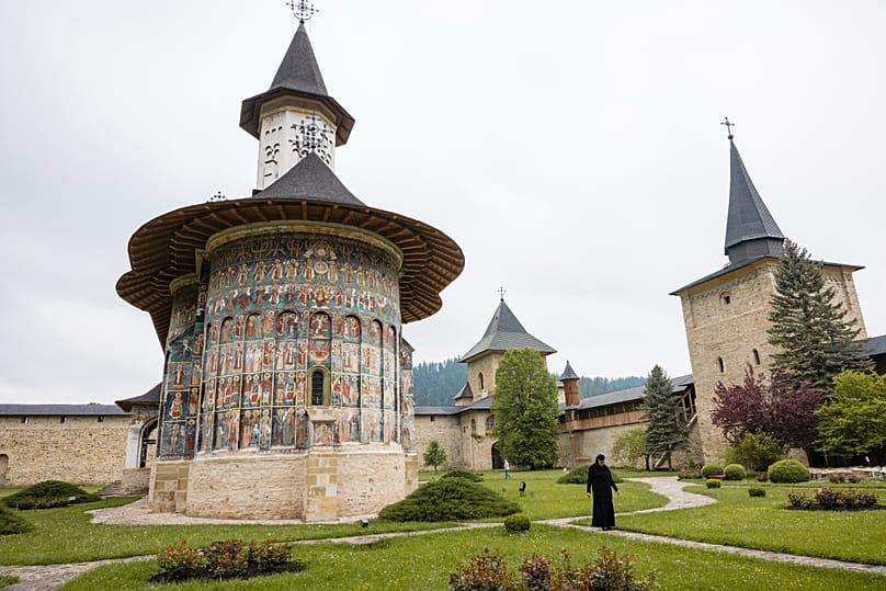 The route passes Sucevița and Moldovița, two of Romania’s UNESCO-designated painted monasteries