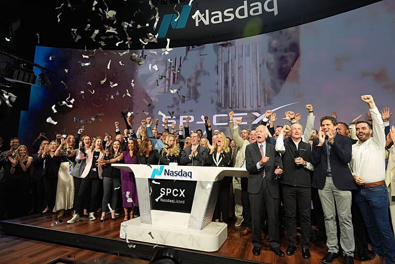 SpaceX employees celebrate during a bell ringing ceremony for the IPO of SpaceX at the Nasdaq MarketSite in New York, 12 June, 2026
