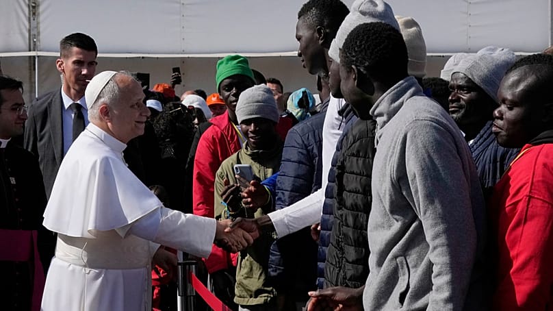 Pope Leo XIV greets attendees as he arrives for a meeting with migrants in San Cristóbal de La Laguna, Tenerife, Spain, on Friday 12 June 2026.