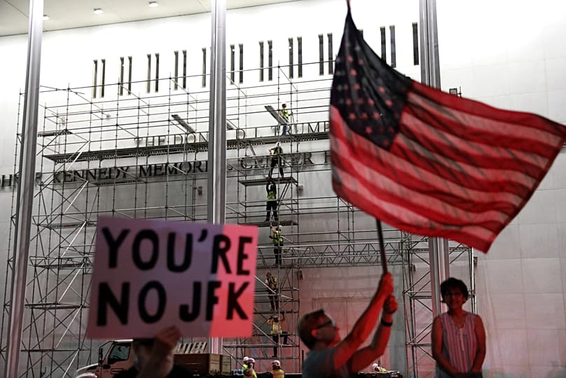 People wait for Donald Trump's name to be removed from the John F. Kennedy Center - 12 June 2026