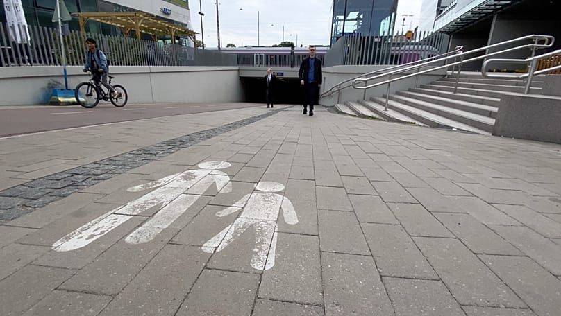 No cars allowed. A recently opened tunnel for pedestrians and cyclists only