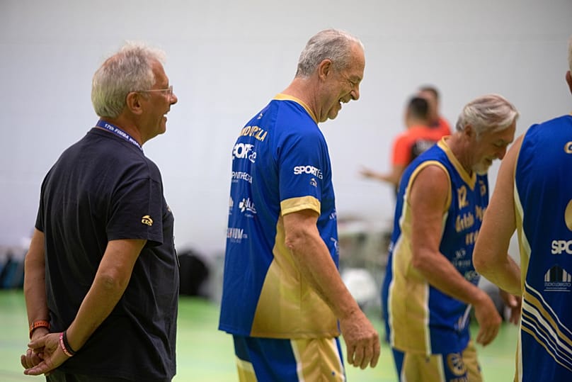 The president of the Golden Players, Virgilio Marino, with some over-65 athletes