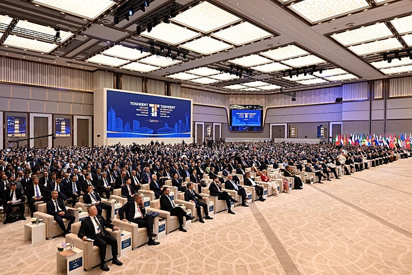 Participants attend the opening session of the fifth TIIF