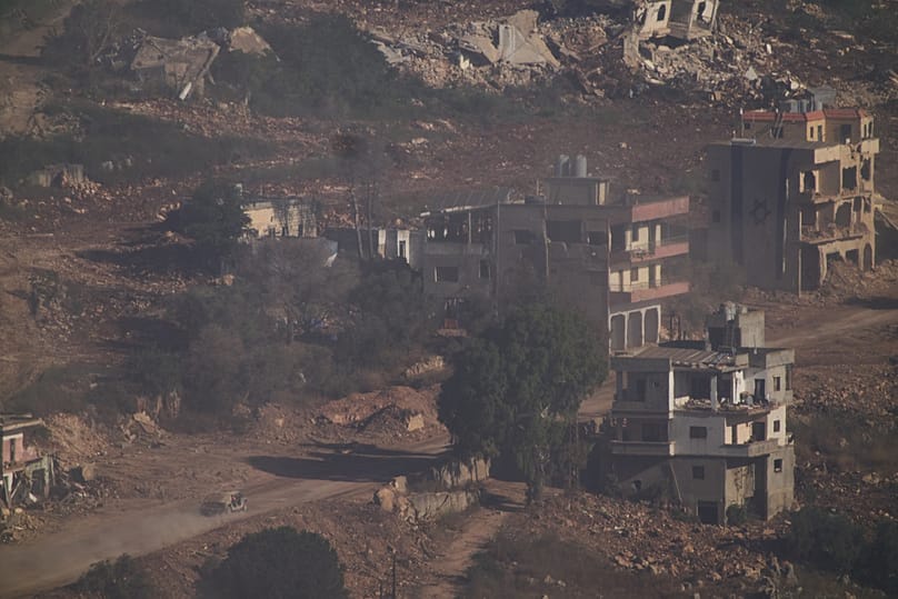 An Israeli military vehicle drives in southern Lebanon seen from northern Israel, Thursday, June 18, 2026