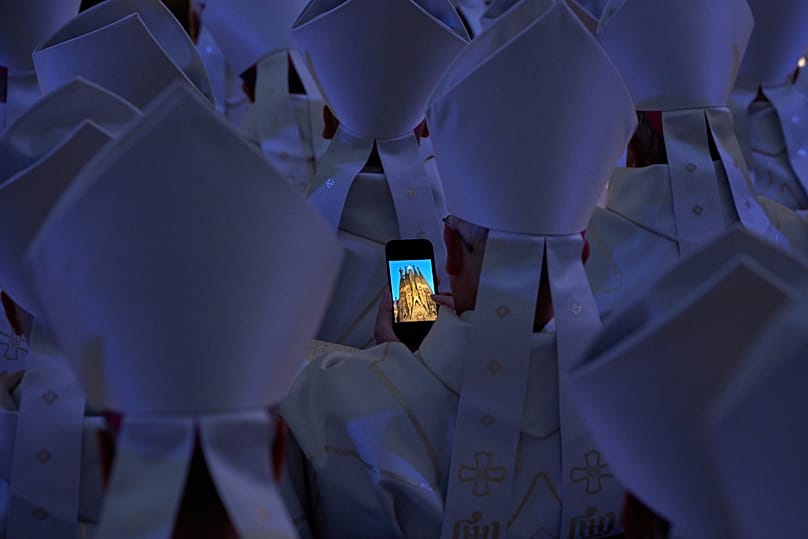 The clergy gather around the Basilica of the Sagrada Familia, designed by Antoni Gaudí, as Pope Leo XIV blesses the Central Tower of Jesus Christ on 10 June 2026.