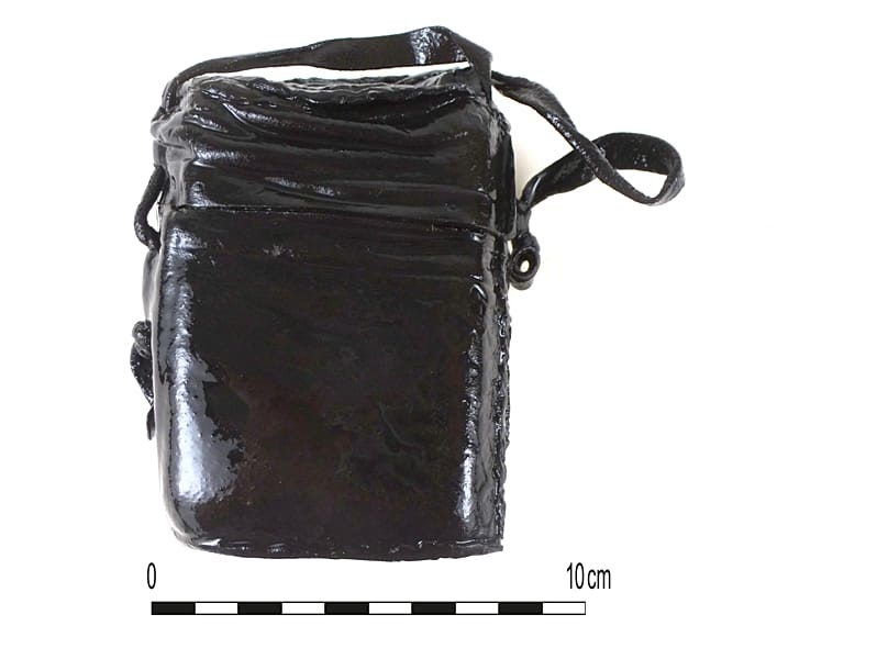 Remarkably, even the pouch in which the little book was kept is well preserved and could almost be contemporary. It bears a lily motif.