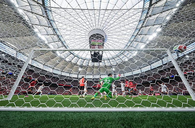 Egypt goalkeeper Mostafa Shoubir allows a goal to New Zealand's Finn Surman during the first half of the World Cup Group G match in Vancouver, Canada, Sunday, June 21, 2026