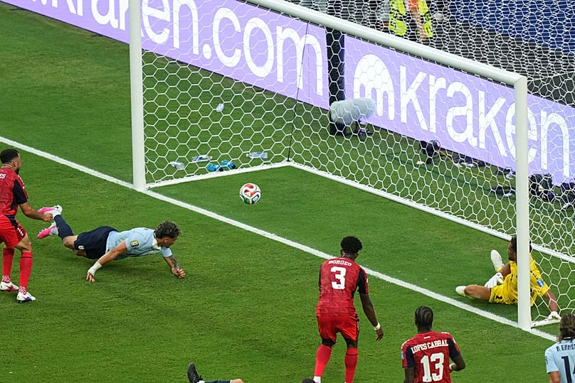 Uruguay's Maxi Araujo scores his side's opening goal during the World Cup Group H match against Cape Verde in Miami Gardens, Florida, Sunday, June 21, 2026