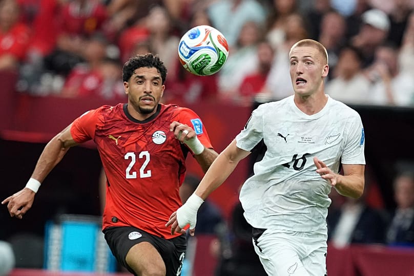 Egypt's Omar Marmoush and New Zealand's Finn Surman vie for the ball during the first half of a World Cup Group G match in Vancouver, Canada, Sunday, June 21, 2026