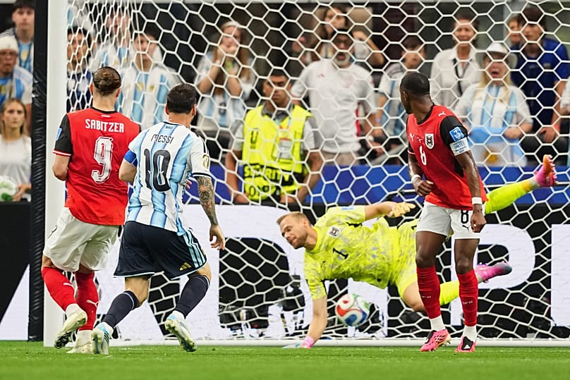 Argentina's Lionel Messi, center, scores the opening goal during the World Cup Group J soccer match between Argentina and Austria in Arlington, Texas,, Monday, 22 June 2026.