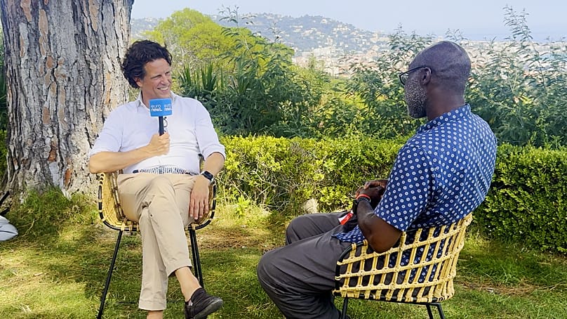 Florian Haller being interviewed by Euronews Culture's Tokunbo Salako