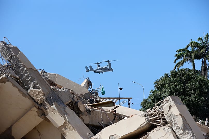 A U.S. military aircraft overflies an area struck by earthquakes in La Guaira, Venezuela, Saturday, June 27, 2026.